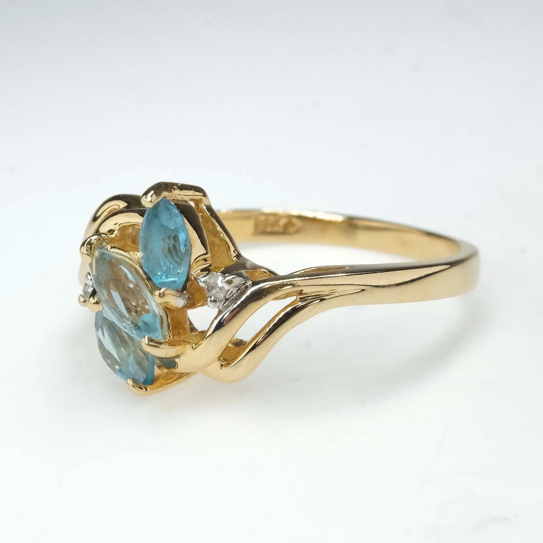 0.57ctw Blue Topaz with Diamond Accents Gemstone Ring in 14K Yellow Gold