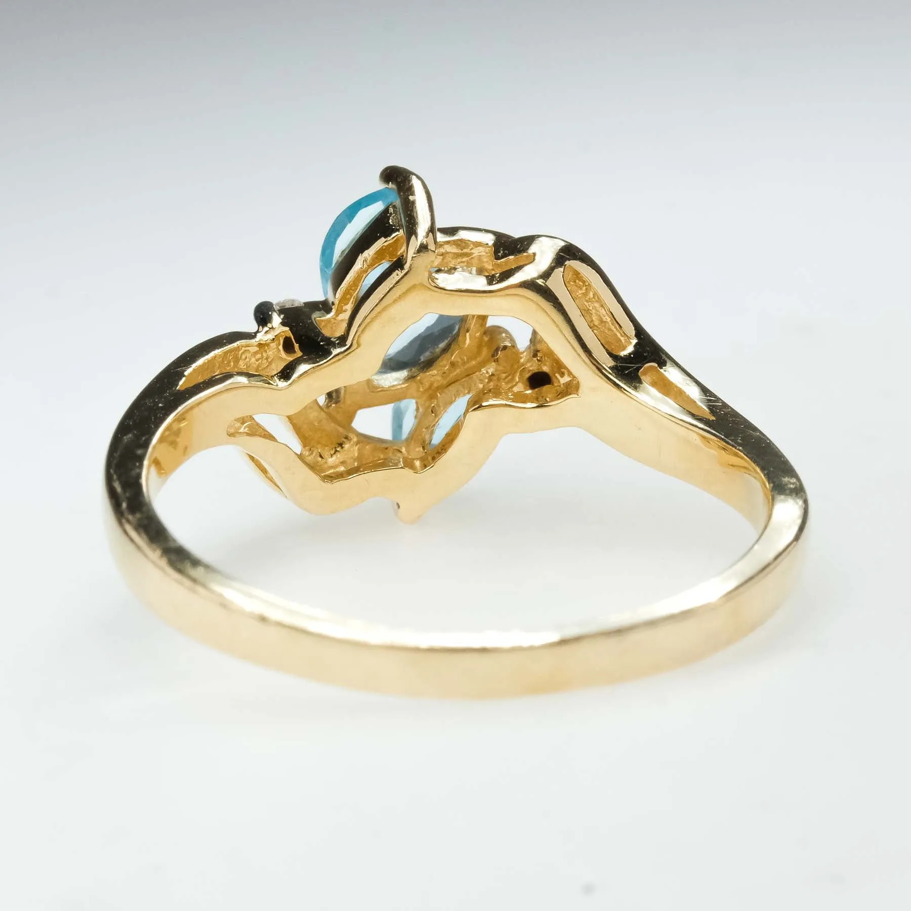 0.57ctw Blue Topaz with Diamond Accents Gemstone Ring in 14K Yellow Gold