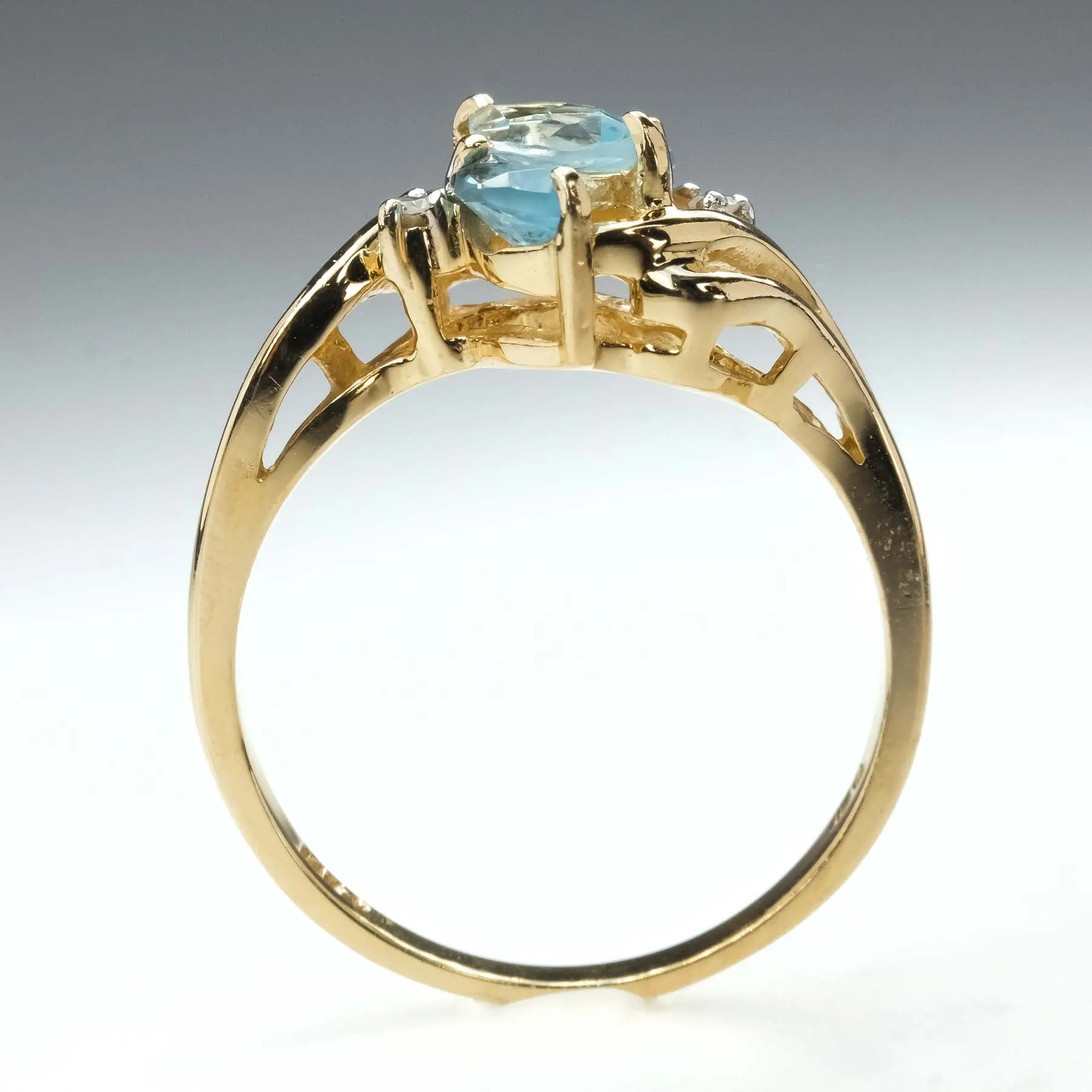 0.57ctw Blue Topaz with Diamond Accents Gemstone Ring in 14K Yellow Gold