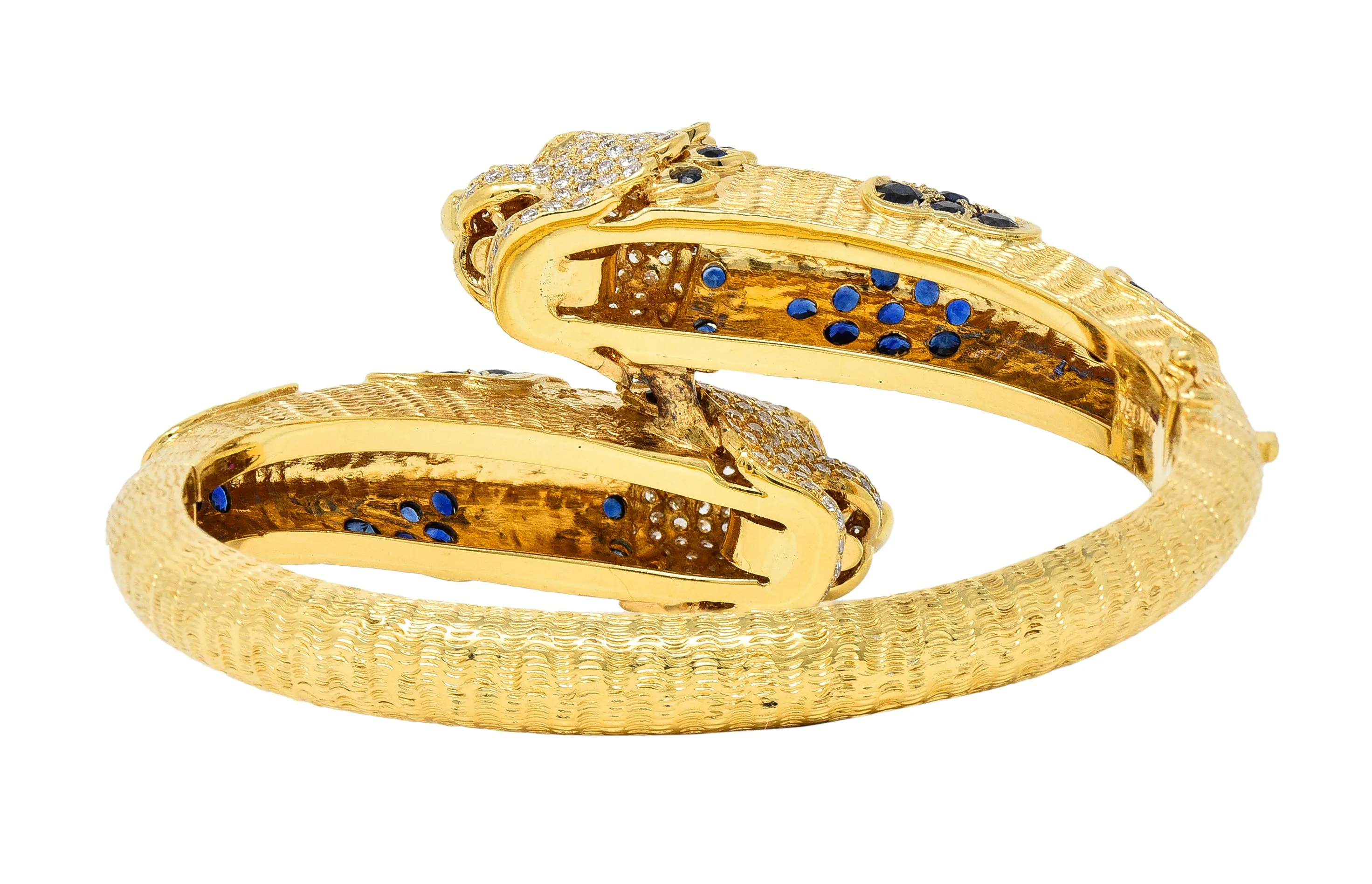 1970's 9.48 CTW Sapphire Ruby Diamond 18 Karat Yellow Gold Lion-Head Vintage Bypass Bangle Bracelet