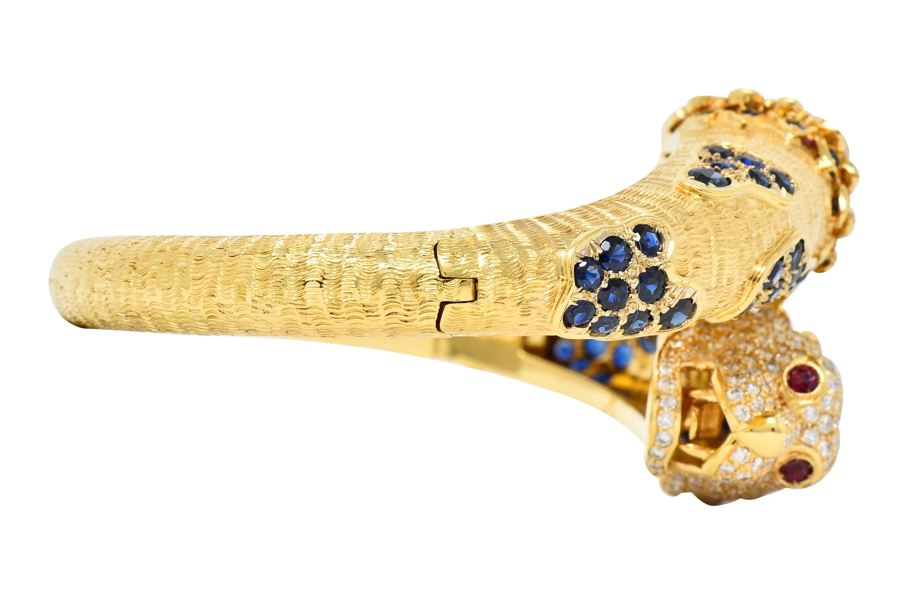 1970's 9.48 CTW Sapphire Ruby Diamond 18 Karat Yellow Gold Lion-Head Vintage Bypass Bangle Bracelet