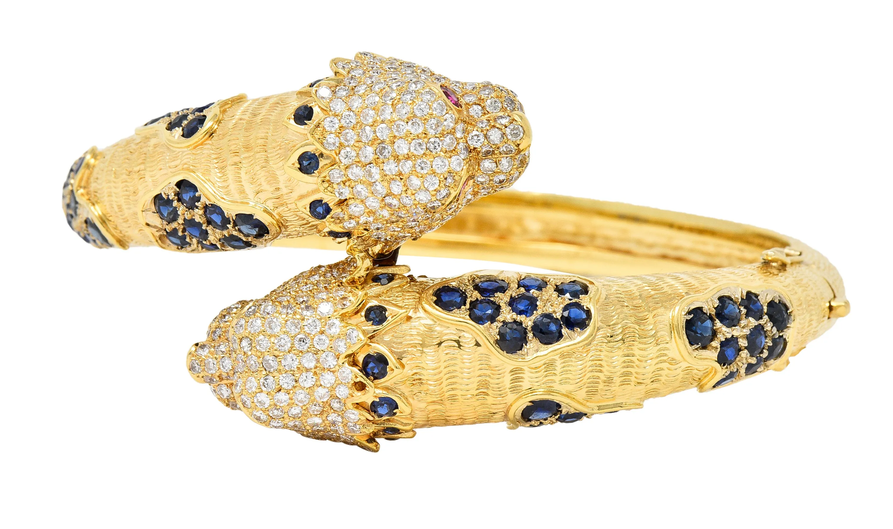 1970's 9.48 CTW Sapphire Ruby Diamond 18 Karat Yellow Gold Lion-Head Vintage Bypass Bangle Bracelet